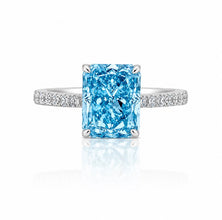 Aquamarine Coloured Emerald Cut Ring