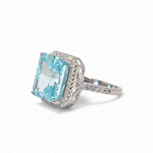 Halo Light Aquamarine Coloured Emerald Cut Ice Stone Ring
