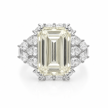 Pale Yellow Coloured Emerald Cut Ring