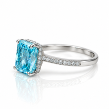 Aquamarine Coloured Emerald Cut Ring