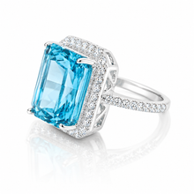 Halo Aquamarine Coloured Emerald Cut Ring