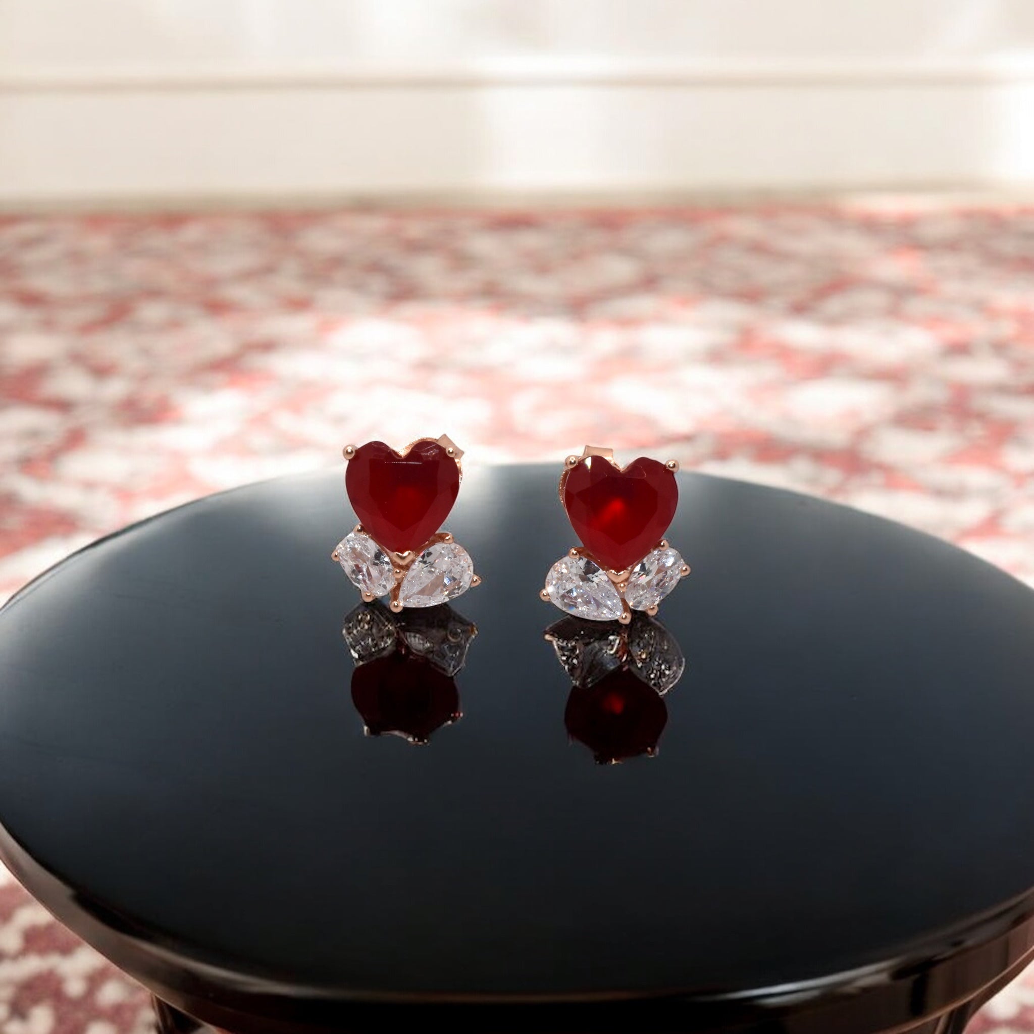 Rose Gold Ruby Coloured Heart Studs