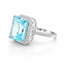 Halo Light Aquamarine Coloured Emerald Cut Ice Stone Ring