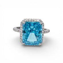 Halo Aquamarine Coloured Emerald Cut Ring