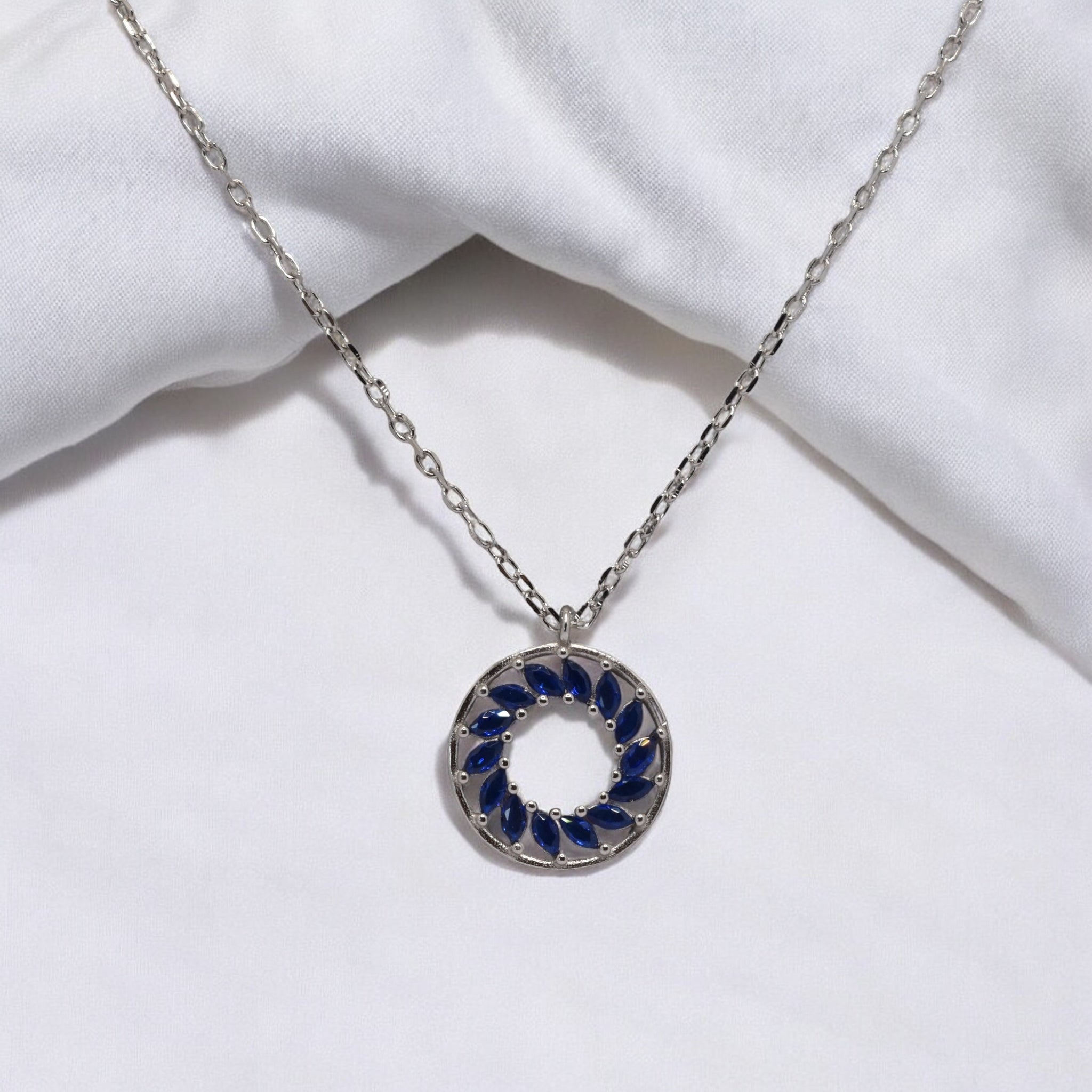 Sapphire Coloured Marquise Round Pendant