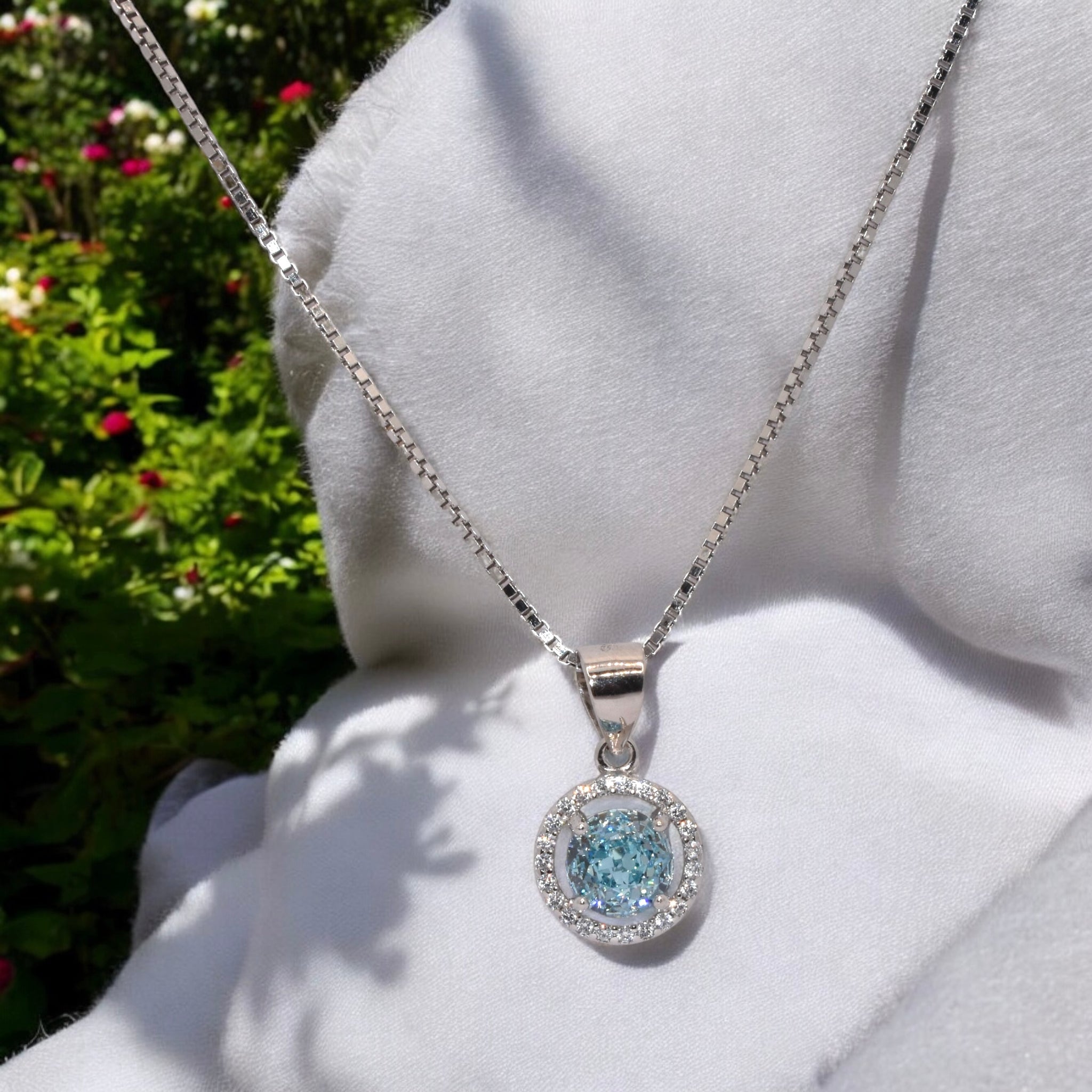 Aquamarine Coloured Ice Cut Solitaire Chain Pendant