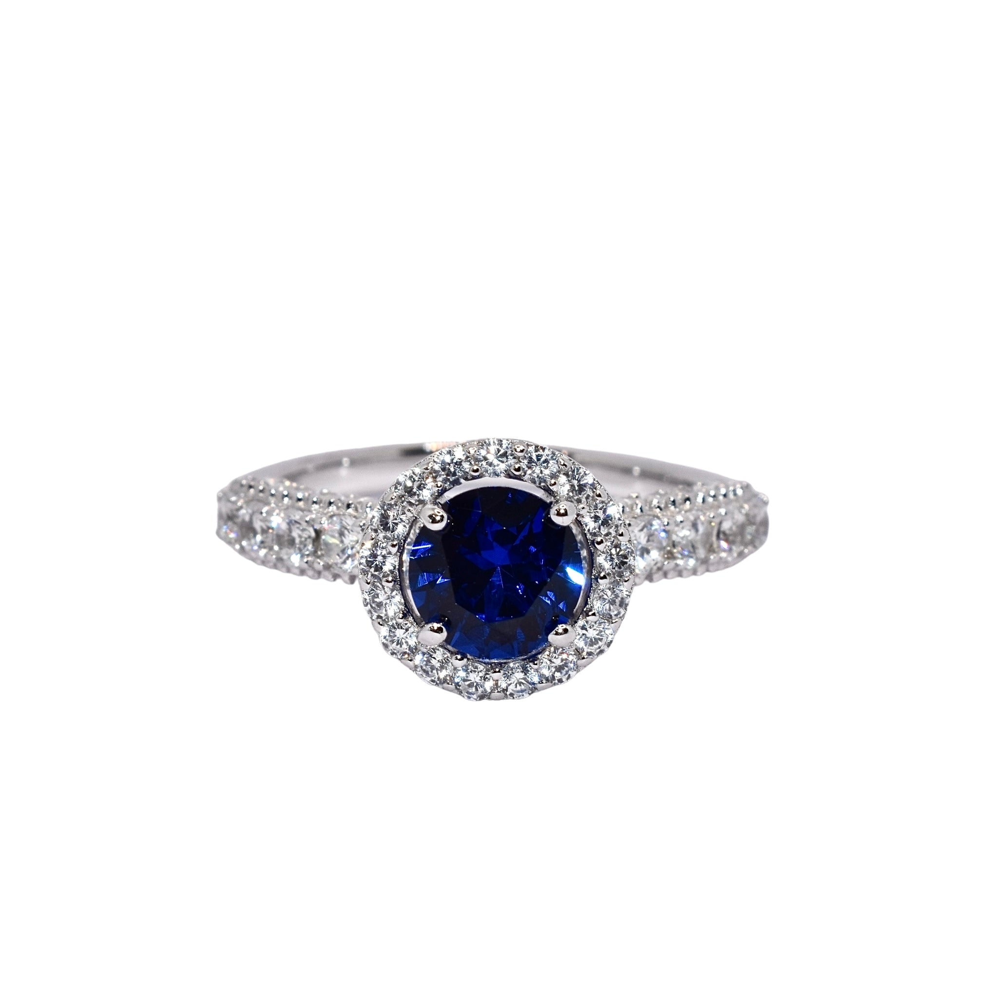 Sapphire coloured Halo Solitaire Ring