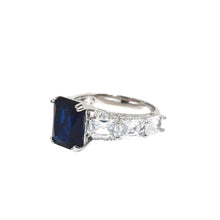 Sapphire Coloured Emerald Cut Ring