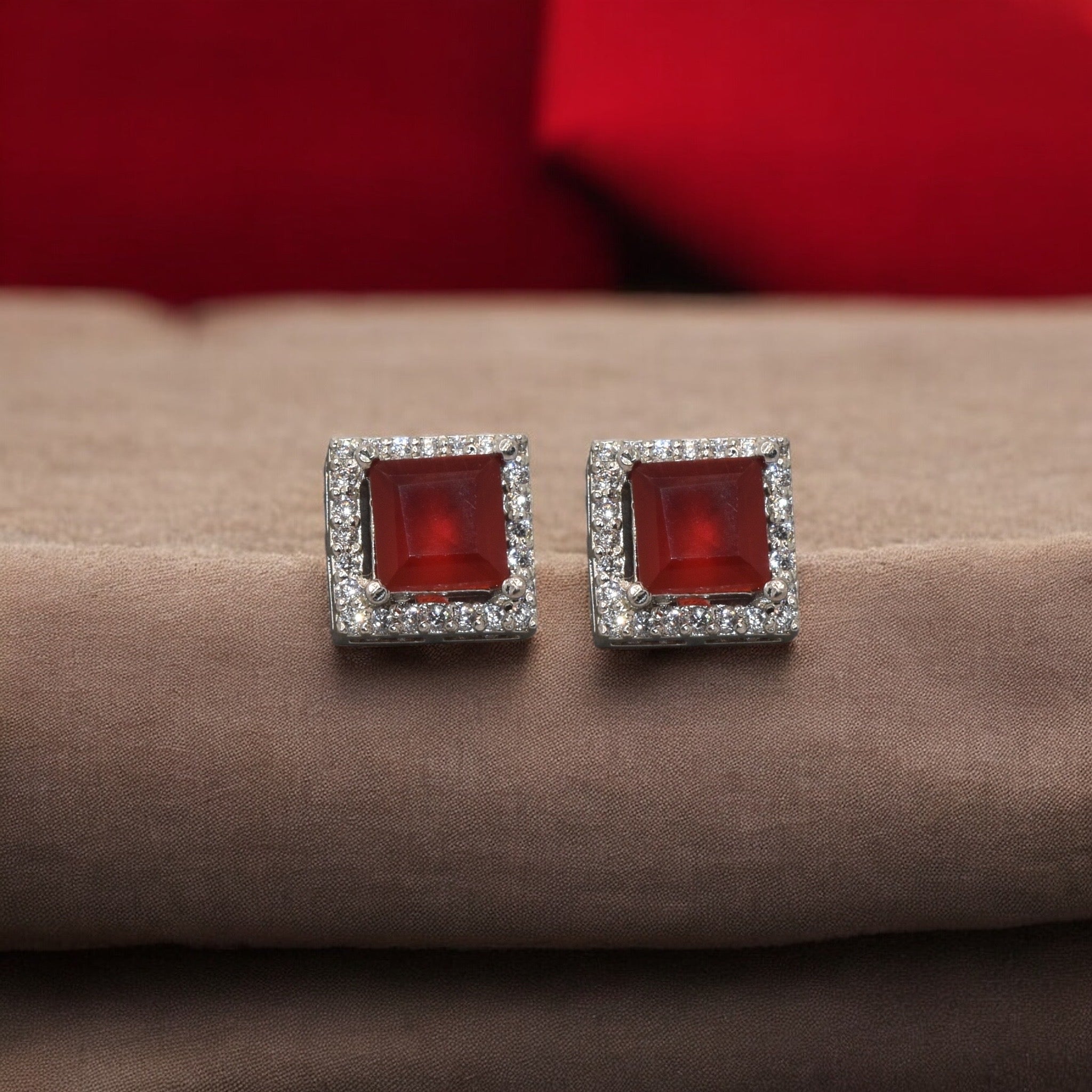 Halo Ruby Coloured Cushion Cut Studs