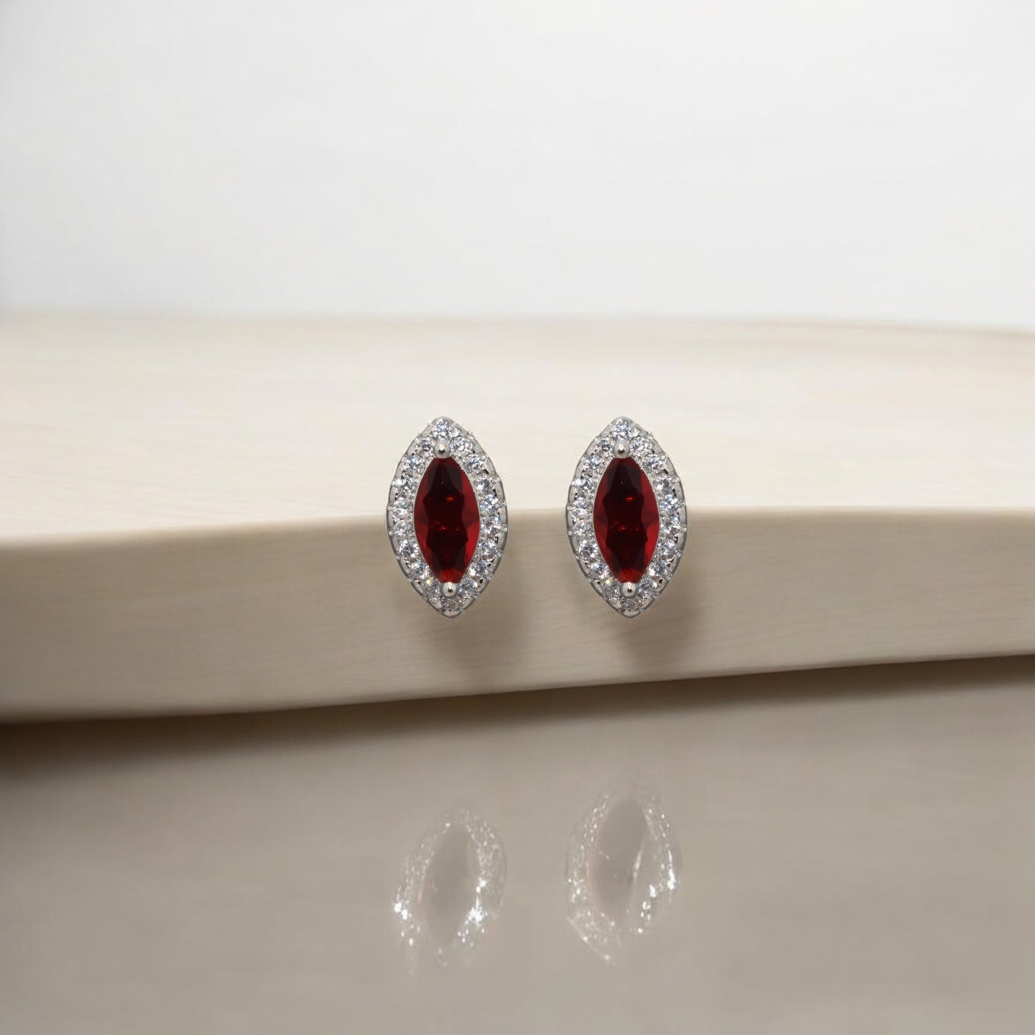 Ruby Coloured Marquise Shape Studs