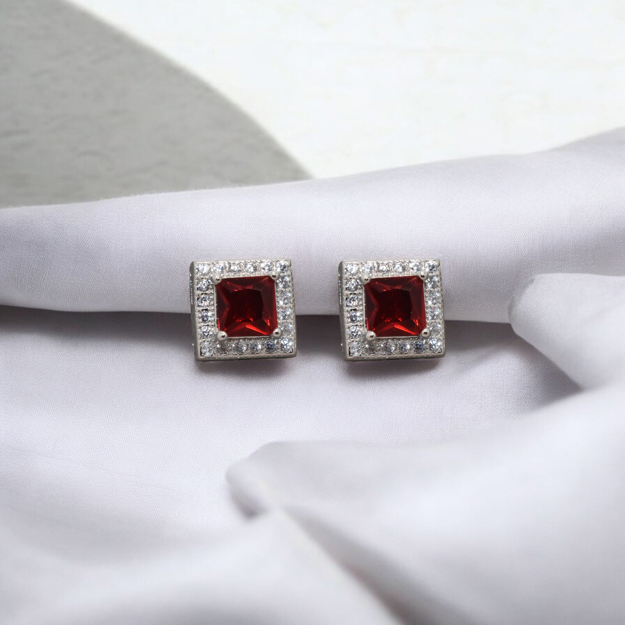 Halo Ruby Coloured Cushion Cut Studs