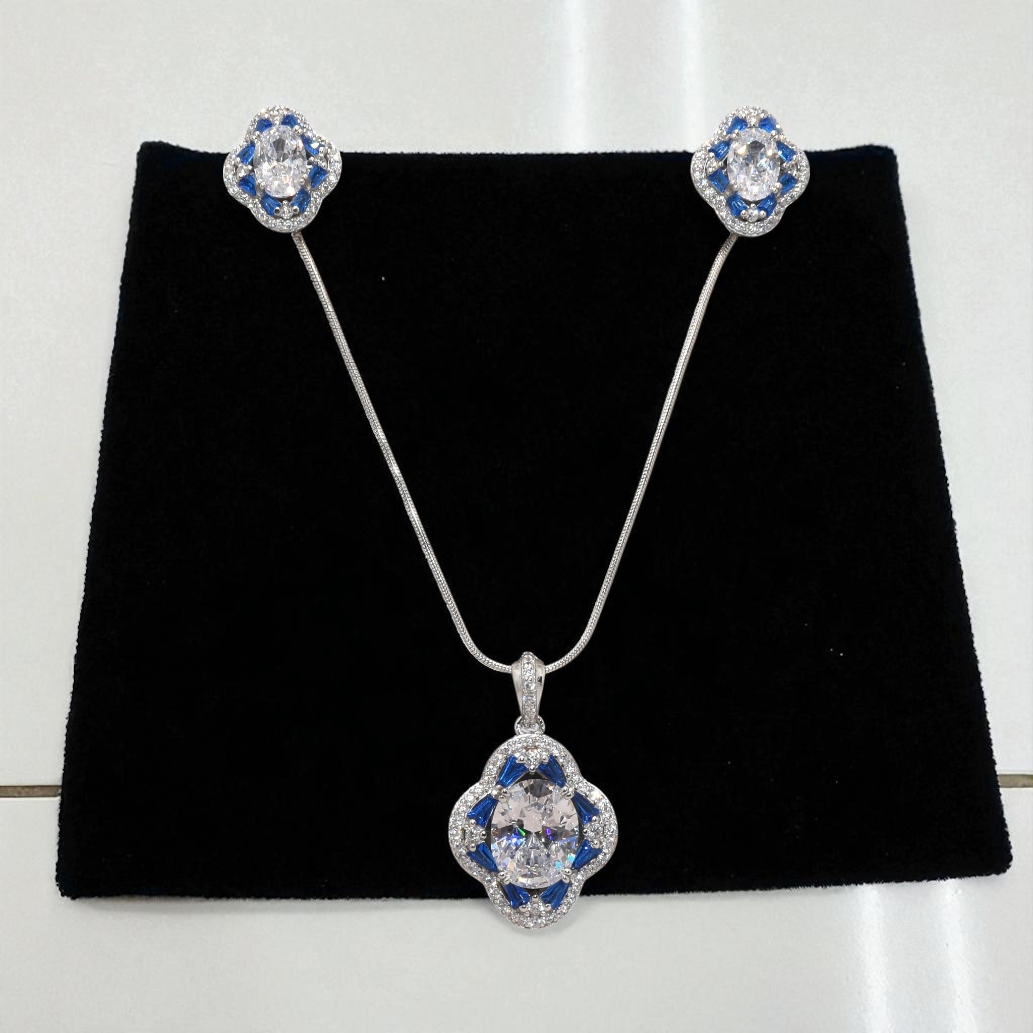 Oval Shape Sapphire Coloured Chain Pendant