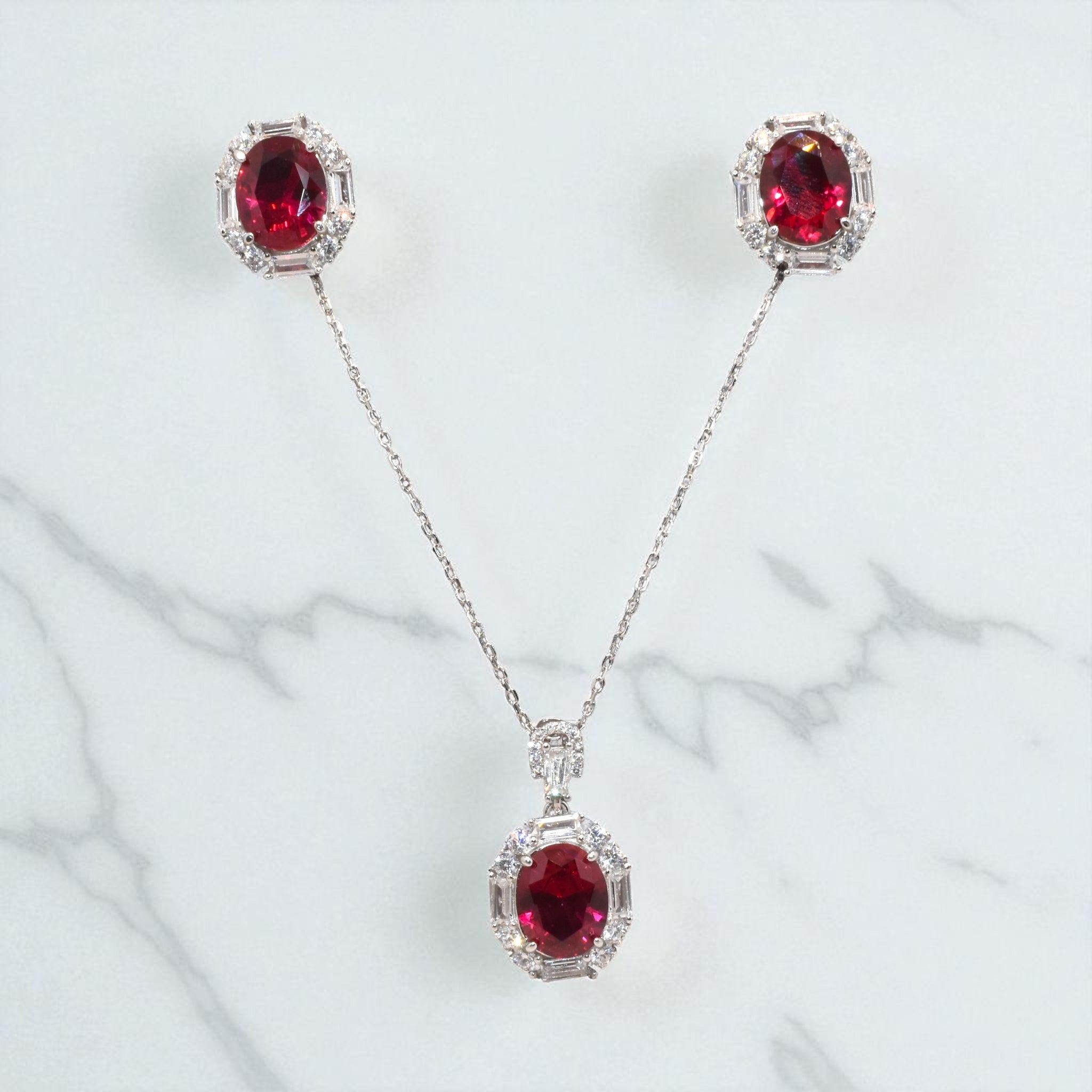 Oval Shape Ruby Coloured Chain Pendant